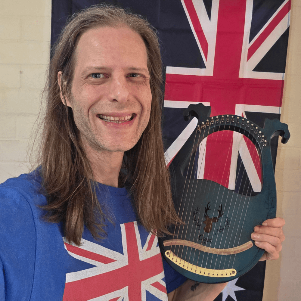 Wendell Charles NeSmith, the Bard President, with his lyre